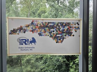 Hexagon CRAN packages at Use R! Conference making the North Carolina shape
